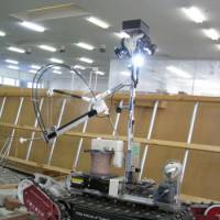 To the rescue: In preparation for a mission inside the Fukushima No. 1 nuclear plant, Quince No. 2 moves through rubble on Monday at the Chiba Institute of Technology. | HIROKO NAKATA