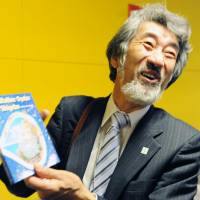 Great protector: Angler-turned-environmentalist Shigeatsu Hatakeyama makes a speech after receiving the Forest Hero award at the United Nations on Thursday. | KYODO