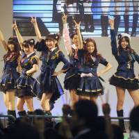 Skirt diplomacy: Members of all-girl idol group AKB48 perform during a special event held Friday in Beijing to thank China for its support in the aftermath of the March 11 disasters. | KYODO