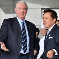 Right this way: Craig Reedie, chief of the International Olympic Committee\'s evaluation commission for the host city of the 2020 Games, is greeted by Tokyo Gov. Naoki Inose on his arrival at a Tokyo hotel Friday. | AFP-JIJI