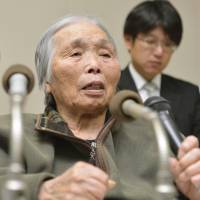 No retrial: Ayako Haraguchi speaks to reporters Wednesday in the city of Kagoshima after the Kagoshima District Court rejected her appeal for a retrial in a 1979 murder case. | KYODO