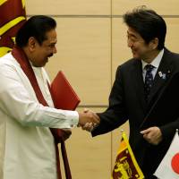 Shared concerns: Sri Lankan President Mahinda Rajapaksa meets Thursday with Prime Minister Shinzo Abe in Tokyo. | AFP-JIJI