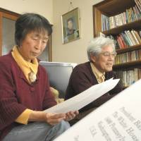 No guns: Mieko and Masaichi Hattori read a copy of the letter they sent to President Barack Obama urging stricter gun controls in the U.S. at their home in Nagoya. Pair who lost son in U.S. shooting write Obama