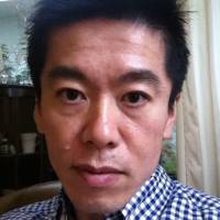 Before and after: Takafumi Horie is seen in an image from his Twitter account Wednesday and (left) in Tokyo on June 20, 2011. Fallen tycoon Horie freed from jail