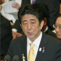 Pressured: Prime Minister Shinzo Abe speaks in a Lower House Budget Committee session Thursday. | KYODO