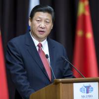 Guest speaker: Chinese President Xi Jinping addresses students from the Moscow State University for Foreign Relations on Saturday. Chinese leader urges preservation of postwar global order
