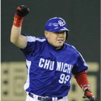 Heroic performance: Norihiro Nakamura of the Chunichi Dragons reacts after hitting a tie-breaking three-run homer in the top of the ninth inning on Saturday at Tokyo Dome. The Dragons beat the Yomiuri Giants 4-3. | KYODO PHOTO