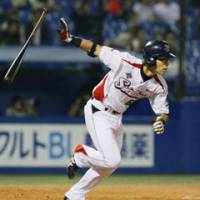 Hard to Swallow: Yakult\'s Ryosuke Morioka hits a run-scoring single against the Chiba Lotte Marines on Thursday. | KYODO PHOTO
