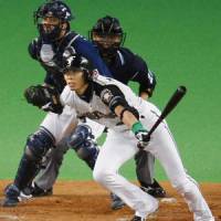 Going ahead: Nippon Ham Fighters outfielder Hichori Morimoto hits a single to break a 4-4 tie in the fourth inning against the Orix Buffaloes on Thursday at Sapporo Dome. | KYODO PHOTO
