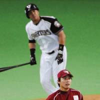 Nippon Ham\'s Terrmel Sledge hits a walkoff grand slam in the bottom of the ninth inning to stun pitcher Kazuo Fukumori and the Rakuten Golden Eagles at Sapporo Dome on Wednesday. The Fighters won 9-8. | KYODO PHOTO