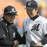 What a game: Yoshihisa Naruse, right, is congratulated by Marines manager Norifumi Nishimura after striking out 12 in a six-hit shutout in a 6-0 win against Orix on Tuesday. | KYODO