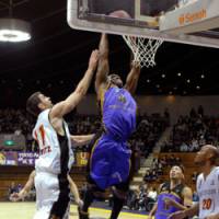 Air time: John Humphrey of the Tokyo Apache rams home a dunk during his team\'s 78-69 loss to the Osaka Evessa at Yoyogi National Gymnasium on Wednesday. | YOSHIAKI MIURA PHOTO