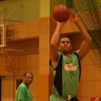 Family affair: Saitama Broncos newcomer Bobby Nash takes a shot during a recent practice while his father, Bob, the team\'s new coach and former NBA player, looks on. The Broncos open the preseason on Sept. 20 against the Tokyo Apache. | KAZ NAGATSUKA PHOTOS