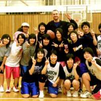 Positive role model: Shiga Lakestars center Ray Schafer (back row) coached students throughout the week during his church\'s visit to Iwaki, Fukushima Prefecture, to assist in the region\'s recovery efforts from the devastating March 11 earthquake. | RAY SCHAFER PHOTO