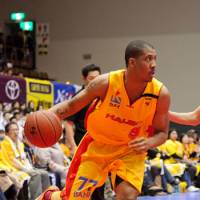 Going strong: Sendai 89ers forward Johnny Dukes keeps his eyes on the developing action in Saturday\'s game against the Shinshu Brave Warriors. Sendai defeated Shinshu 96-78 in overtime. | DOMINIKA FITZGERALD