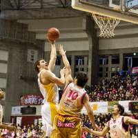 Rivalry renewed: Akita Northern Happinets veterans Kazuhiro Shoji (10) and Ryosuke Mizumachi helped their club win three of four games against the Sendai 89ers this season. Filip Toncinic, seen shooting the ball, and his teammates are ready to avenge those earlier losses in this weekend\'s first-round playoff series. | DOMINIKA FITZGERALD