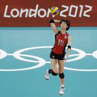 Going against the best: Saori Kimura serves against world champion Russia in their Pool A match on Friday at Earls Court. Russia won 27-25, 25-17, 20-25, 25-19. | AP