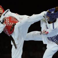Best foot forward: Taekwondo gold medalist Hwang Kyung Seon has contributed to a successful London Games for South Korea. | AFP-JIJI