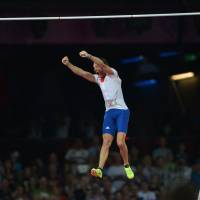 Soaring: France\'s Renaud Lavillenie celebrates on his winning try of 5.97 meters in the pole vault on Friday night. | AFP-JIJI
