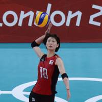 On the attack: Saori Kimura serves during the bronze-medal game on Saturday. | AFP-JIJI