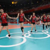 Party time: Erika Araki (left) leads her Japan teammates in celebration after beating South Korea for the Olympic bronze volleyball medal on Saturday. | AFP-JIJI