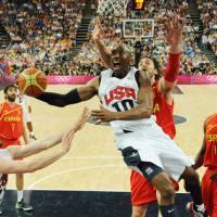 Kings of the court: U.S. guard Kobe Bryant attempts to score against Spain during the men\'s basketball final on Sunday in London. The U.S. won 107-100. | AFP-JIJI