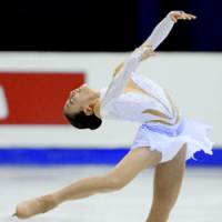 Mao Asada performs during Thursday\'s short program of the ISU Four Continents Championships in Goyang, South Korea. Asada is in first place, 0.87 points ahead of compatriot Miki Ando, the reigning world champion. | KYODO PHOTO