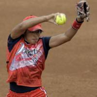 Superb performance: Yukiko Ueno pitched 28 innings over the last two days of the Olympic softball competition, leading Japan to its first-ever gold medal in the event. | AP PHOTO