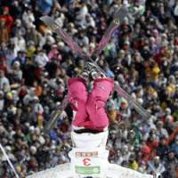 Aiko Uemura performs an iron cross in the women\'s moguls finals at the freestyle world championships in Inawashiro, Fukushima Prefecture, on Saturday. Victory in the event gave Uemura her first world title and a ticket to the 2010 Vancouver Olympics. Story: Page 17 | AP PHOTO
