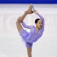 Tough spot: Defending world champion Mao Asada is in third place after the short program. | AP PHOTO