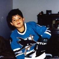 Future Shark: Devin Setoguchi wears a San Jose Sharks uniform given to him as a Christmas present when he was six years old growing up in Taber, Alberta. | SAN JOSE SHARKS