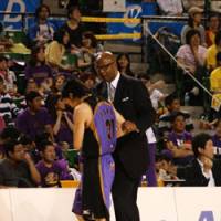 Strong mentor: Tokyo Apache coach Joe Bryant, in his fourth season at the helm, takes pride in helping the team\'s Japanese players, including Masashi Joho (pictured) raise their level of play. | KAZ NAGATSUKA