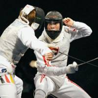 Great accomplishment: Fencer Yuki Ota (right), who earned a silver medal in the men\'s foil competition in the 2008 Beijing Olympics, is now No. 1 in the world rankings. | KYODO PHOTO