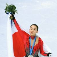 Icon for the ages: The prodigious fan base of two-time world champion Mao Asada stretches around the globe. | AP PHOTO