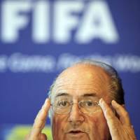 Eye of the storm: FIFA president Sepp Blatter will oversee the voting for the 2018 and 2022 World Cup hosting rights on Thursday in Zurich. | AP PHOTO