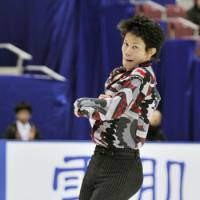 Stellar outing: Takahiko Kozuka skates during the men\'s short program at the national championships. | KYODO PHOTO