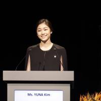 Charismatic: Kim Yu Na dazzled IOC members in South Africa this week as she promoted Pyeongchang\'s bid to host the 2018 Winter Olympics. | AP PHOTO