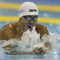 Back in action: After skipping the 2009 FINA World Swimming Championships in Rome, Kosuke Kitajima won a silver medal in the 200-meter breaststroke. last week in Shanghai. | AP