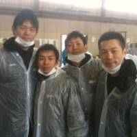 Helping those in need: (Left to right) Sendai 89ers forward Daisuke Takaoka, guard and team captain Takehiko Shimura, guard Hikaru Kusaka and former coach Honoo Hamaguchi helped with relief efforts after the Great East Japan Earthquake in the spring. Shimura is a team leader and active in volunteer efforts off the court. | SENDAI 89ERS / BJ-LEAGUE