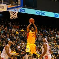 Chip off the block: T.J. Cummings is an elite player in the bj-league, following in the footsteps of his father, Terry, who had an 18-season NBA career. Cummings, father share hoop bond
