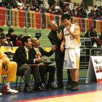 Disappointing season: Despite their struggles, Sendai 89ers guard Hikaru Kusaka, seen talking to former coach Bob Pierce along with team interpreter Torahiko Enda (second from left) and general manager/current acting head coach Takeo Mabashi, and his teammates continue to be a symbol of inspiration in Miyagi Prefecture. The team was actively involved in relief efforts immediately following the Great East Japan Earthquake and tsunami in March 2011.  | KAZ NAGATSUKA