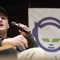 Boy genius: Shawn Fanning, who together with fellow teenager Sean Parker founded Napster in 1999, gives a presentation in 2001. While still in high school he wrote the file-sharing software that revolutionized the digital music industry. | BLOOMBERG