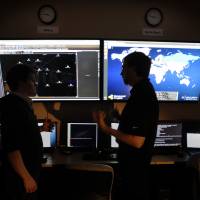 Cyber sleuth: Dell SecureWorks’ Joe Stewart (right), who spends his days hunting Internet spies, is mapping the digital weapons and organizations behind China’s vast cyber-espionage effort against American and European corporations. PLA hackers are just the tip of cyberwarfare risk
