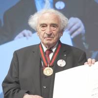 Lest we forget: Max Mannheimer, who has dedicated his life to telling German schoolchildren about his experience in the Dachau concentration camp, is shown receiving an award last May. Mannheimer says “Ordinary Germans knew about the camps, but not the torture and experiments that happened there. Survivor recalls Dachau on its 80th anniversary