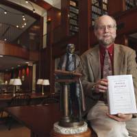 To the letter: Historian J. Jefferson Looney holds one of several volumes of “The Papers of Thomas Jefferson.” Historian seeks to have Jefferson speak for himself