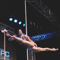 Poles apart: Mai Sato, winner of the Women\'s Division at the 2010 International Pole Championship in Tokyo, poses on the pole. | MAMI MARUKO PHOTO