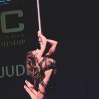 Hangin\' out: Zoraya Judd, U.S. winner of the Women\'s Pole Art category of the 2010 International Pole Championship in Tokyo, steals the fashion show, too. | MAMI MARUKO PHOTO