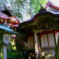 Ancient Takuhi Shrine that emerges from a hilltop cave. | ANGELES MARIN PHOTO