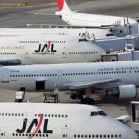 Parking spot: Japan Airlines planes sit at Haneda airport in Tokyo on Feb. 8. | AP PHOTO