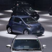 Smart cars?: Toyota iQ compacts are displayed during their Oct. 15 debut in the city of Chiba. | BLOOMBERG